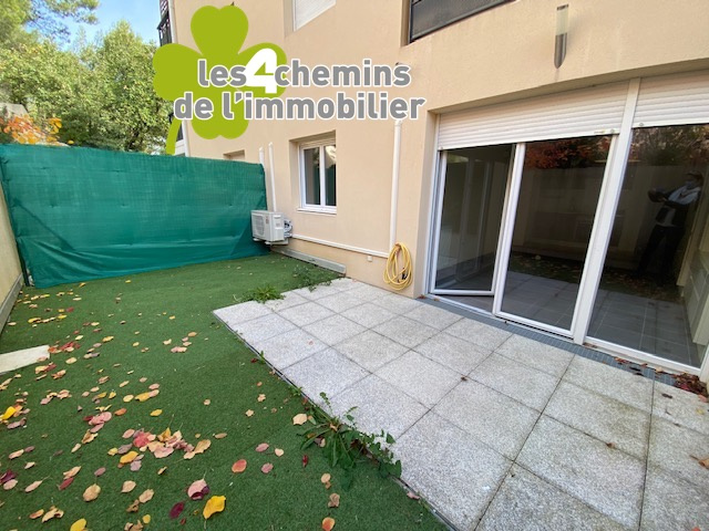 T2  avec terrasse, jardinet  et double box en sous sol 